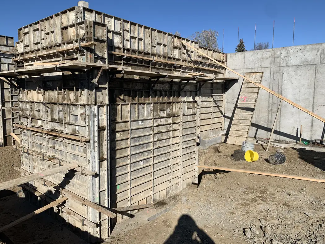 A wider view shows the supported wall forms and corner assembly.