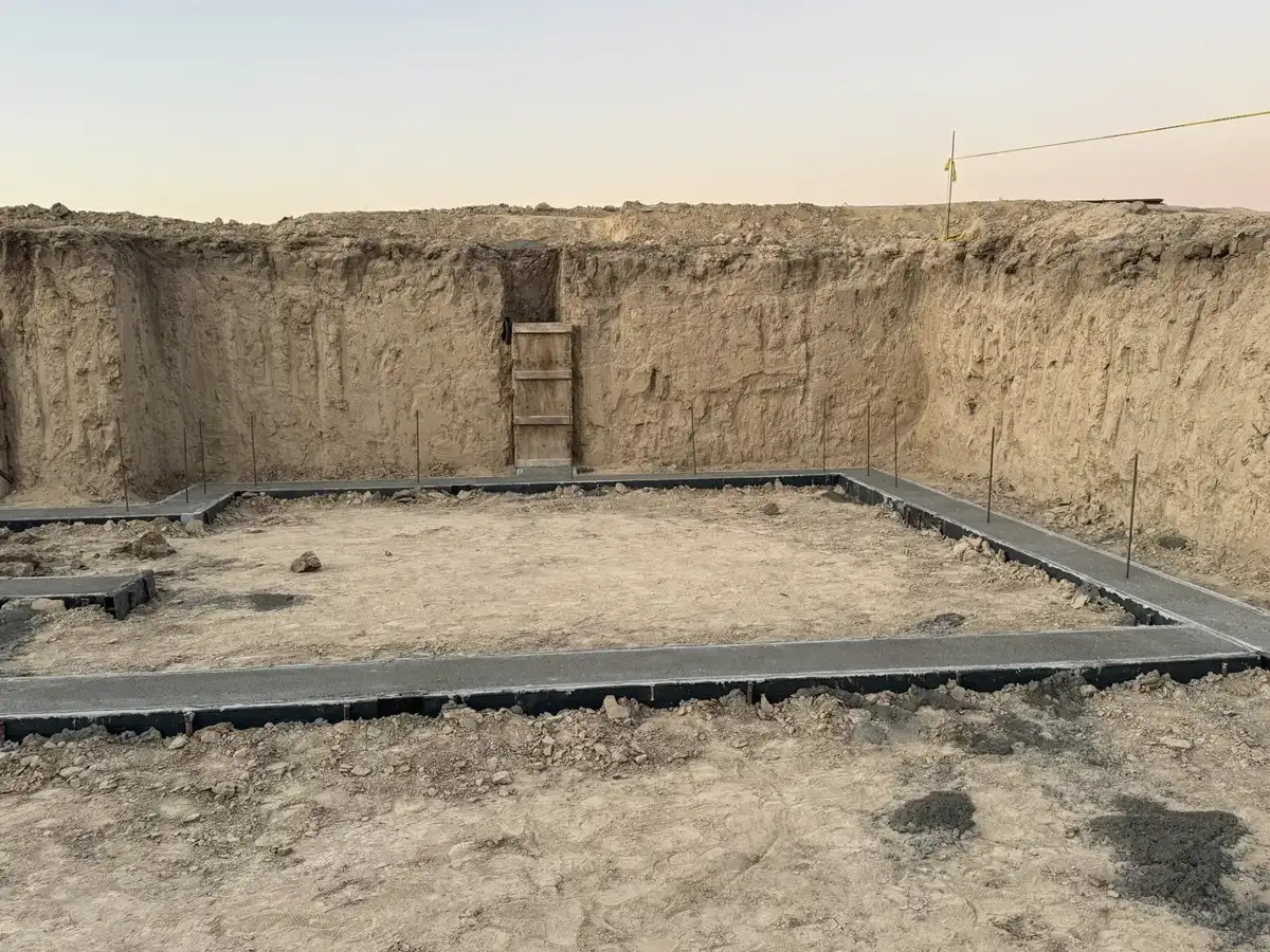 Completed perimeter footings within basement excavation