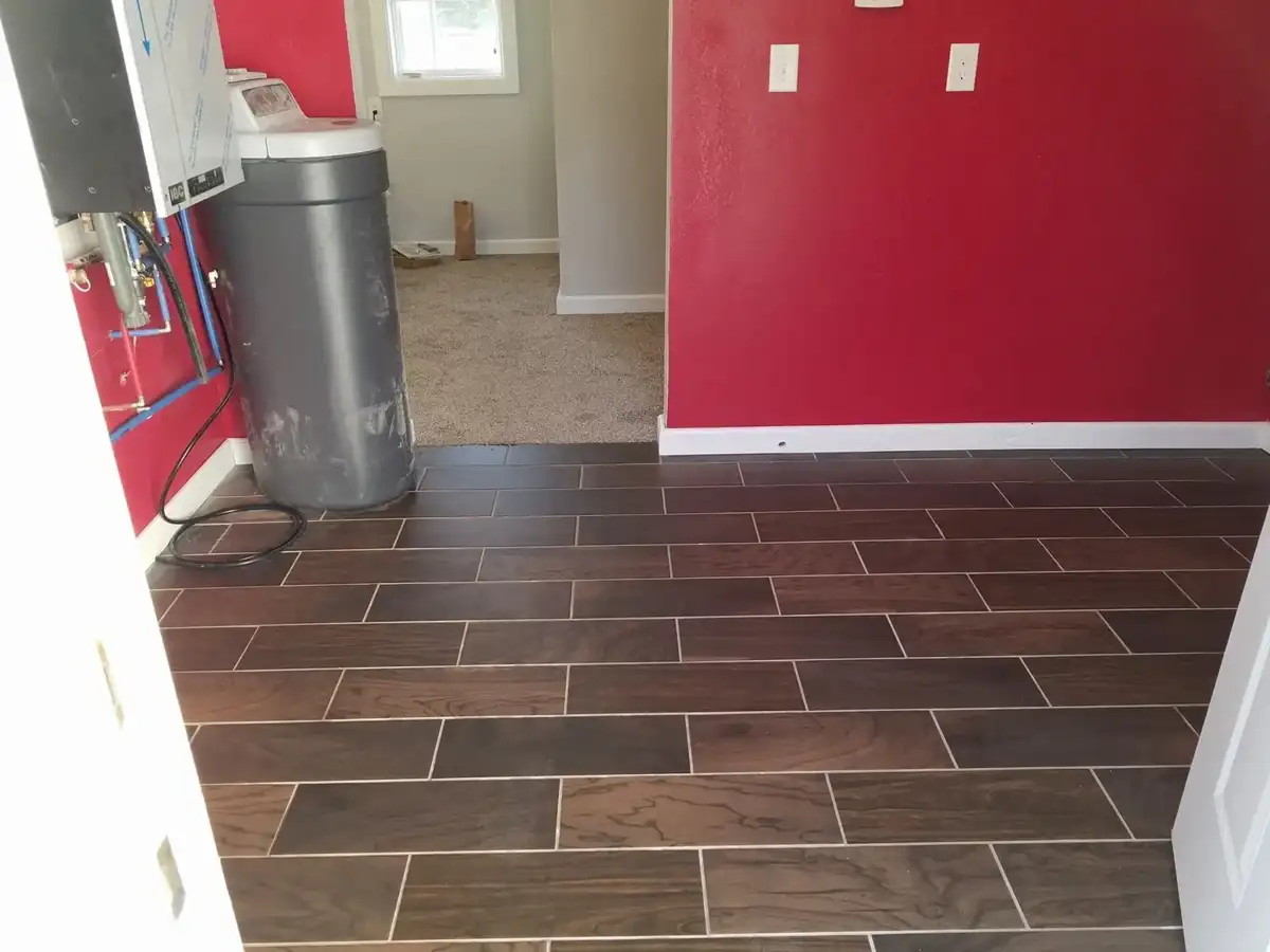 Wood-look tile flooring in the finished utility area