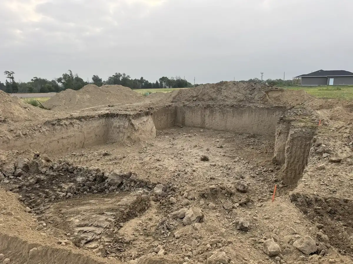 Basement excavation and prepared building footprint