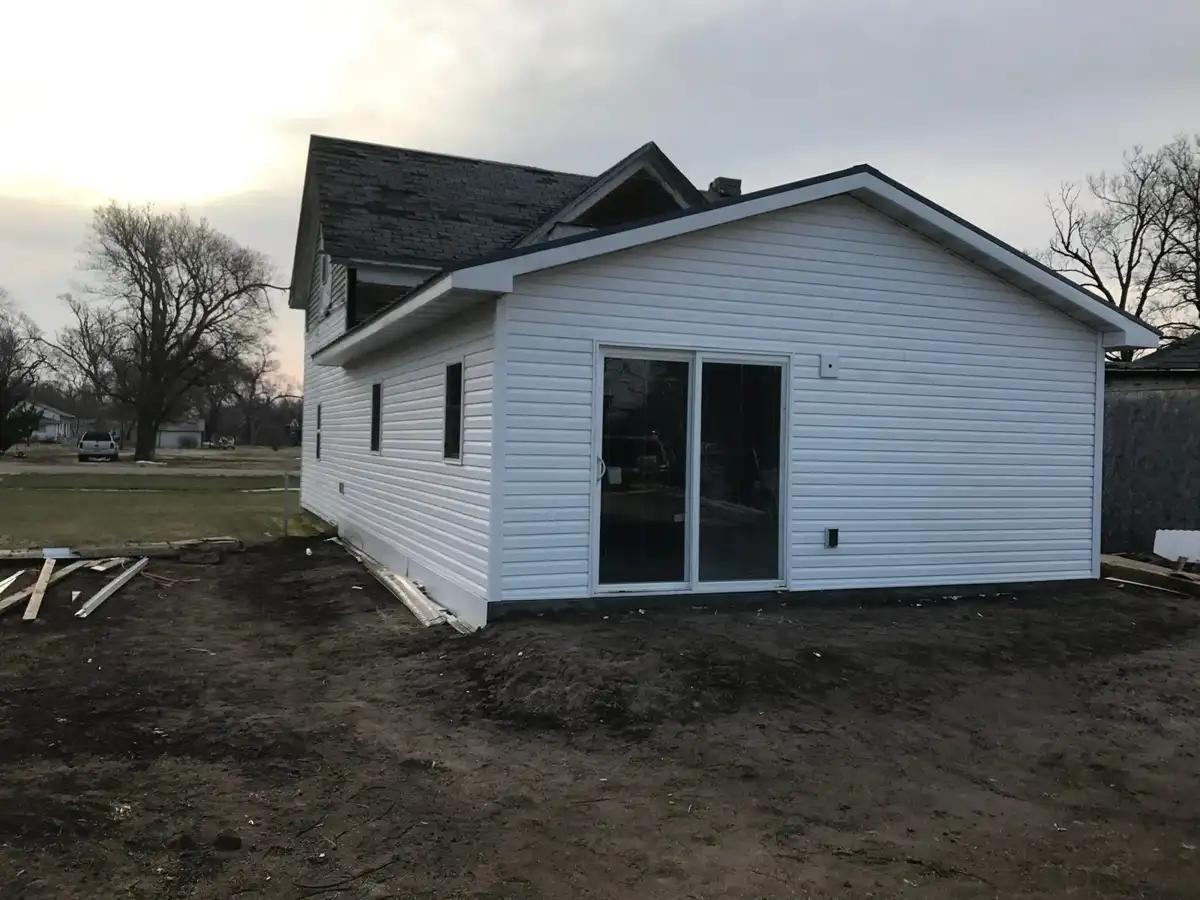 Finished siding on the addition and installed windows
