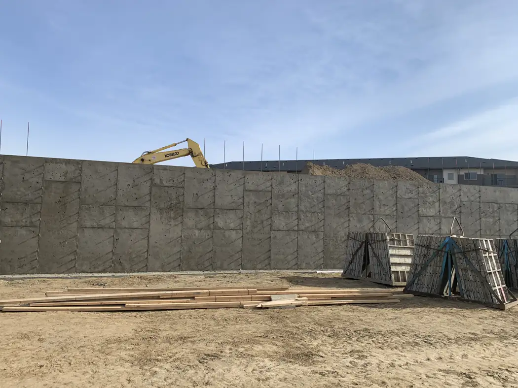 Concrete walls are exposed after the forms have been removed.